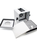 Compact Desktop Solder Fume Extractor With Dual Stage Air Purifier, disassembled showing fan, filters and exterior.