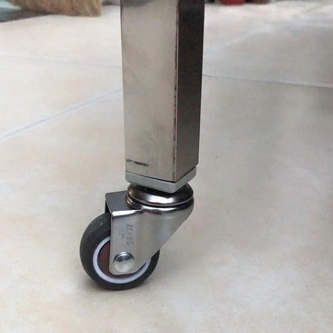 Close-up of Premium Swivel Rubber Caster Wheels Set Of Four Featuring Ball Bearing Spin Silent Glide Action Non Marking Footpads mounted on square tubing.