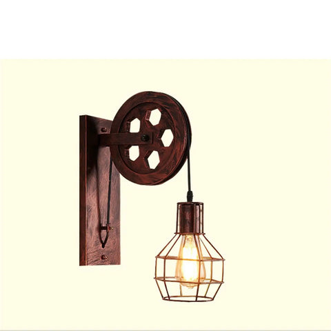 Absolutely Sick Industrial Wall Lamp With Vintage Pulley Handle Crafted From Heavy Wrought Iron Ideal For Barn Lofts And Man Caves With Super Cool Diffused Lighting wall sconce with pulley and cage light