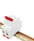 Badass Din Rail Circuit Breaker Featuring Killer Solar Panel Overload Protection Switch for RV Campers and Homes With Beefy Automatic Air Switch Up to 63 Amps 500V Rating mounted on a rail.