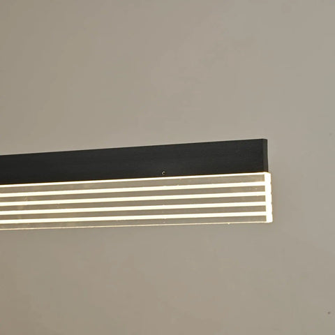 Modern LED Chandelier Pendant Light With Dimmable Linear Design, gold frame detail, hanging in room.