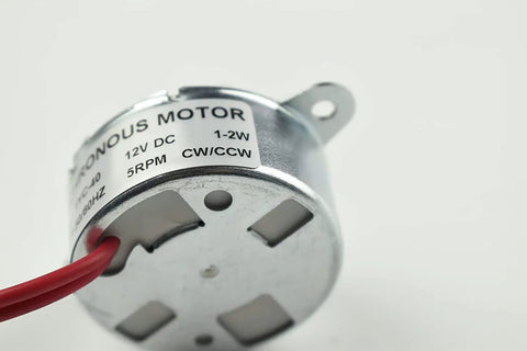 TYC-40 12V Synchronous Motor 5 RPM CW CCW with flat 35mm shaft, showing compact design and wiring