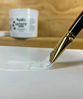 Artists Gesso Primer For Acrylic Painting White 1 Gallon For Canvas Prep with brush on canvas