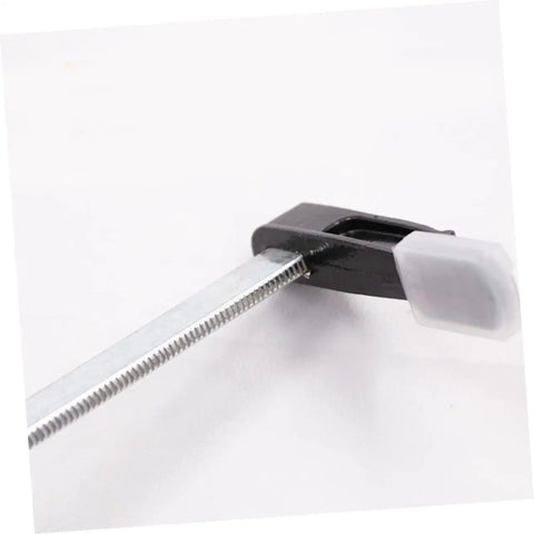 Close-up of heavy duty woodworking clamp, steel clip visible. Heavy Duty Woodworking Clamps Set For Fastening Pliers And Quick Clamps Your Go To Tool For Industrial And Crafts Durable Steel Clips Simple To Use And Built To Last For Secure Woodworking Projects