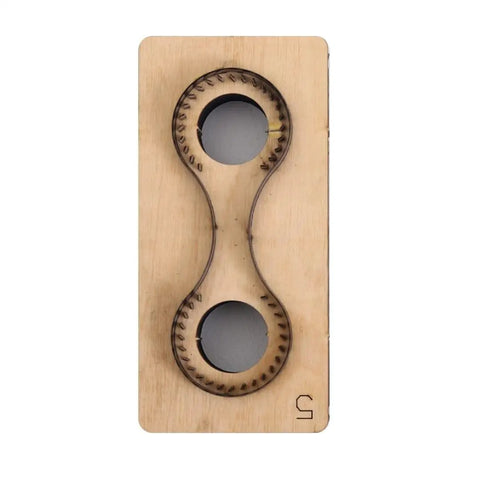 Top view of Teardrop Cutting Mold Set for DIY leather crafting tools with wooden steel rule punch for leather projects.