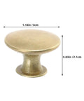 Close-up of a Vintage Round Cabinet Knob in gold finish, showing its size, for Kitchen and Furniture Antique Dresser Pulls.
