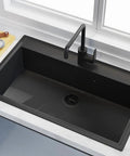 Matte Black Kitchen Sink Drain Kit With Stainless Steel Body And Basket Stopper For Universal Three And A Half Inch Drains installed