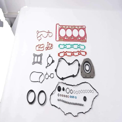 Heavy Duty 4 Piece Cylinder Head Overhaul Gasket And Seal Kit For Audi A4 S3 Q5 1.8L 2.0L displayed with various gaskets and seals.