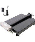 Heavy Duty Shipping Scale With 660 Pound Capacity Foldable Digital Platform showing the sleek black design and power adapter.
