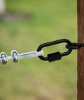 Heavy One Eighth Inch Quick Link With Storm Shine Finish for secure chain rigging on a post with rope attachment.