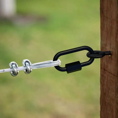 Heavy One Eighth Inch Quick Link With Storm Shine Finish for secure chain rigging on a post with rope attachment.
