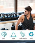 Man sitting in a gym near kettlebells and dumbbells with icons indicating mute, stability, wear-resistance, and safety