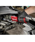 Using M12 Fuel Three Eighths Inch Ratchet Bare Tool With Fifty Five Ft Lbs Torque Ultra Compact Head in engine compartment