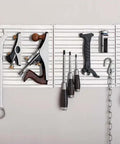 Magnetic Tool Holder 12x12 Inch Garage Organization Panel For Wall Mount Storage with tools attached, durable steel construction.