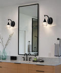 Bathroom with Crystal Bubble Wall Sconce With Dimmable LED 5W, 3300K Warm White, Matte Black Finish over mirror and sink
