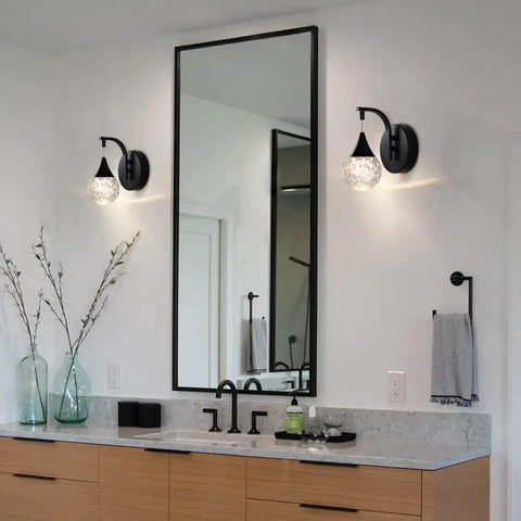 Bathroom with Crystal Bubble Wall Sconce With Dimmable LED 5W, 3300K Warm White, Matte Black Finish over mirror and sink