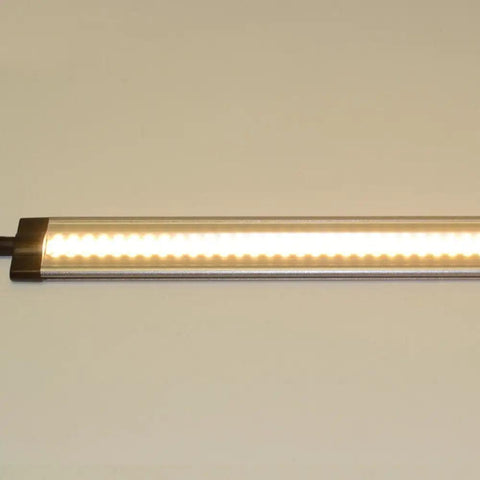 12 Inch Dope Warm White Modular LED Under Cabinet Lighting Panel With 42 LEDs, 280 Lumens, 3000K, 24V DC, 3W Per Panel, shown lit up