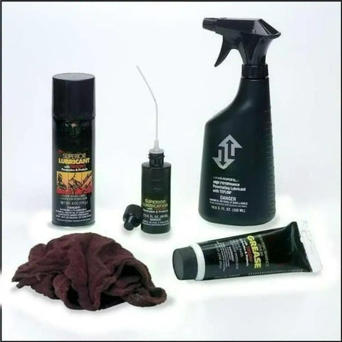 Assorted lubricant products including aerosol can, oil bottle, spray, and cloth, not Tri-Flow PTFE Industrial Lubricant 12 Oz