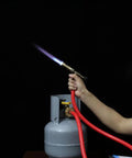 Premium Replaceable Propane Torch For Welding And Brazing With Self Ignition Lock, ergonomic brass gas flamer in use.