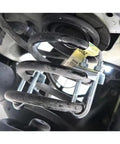 Adjustable Coil Spring Lowering And Leveling Kit installed on vehicle suspension, showcasing shock absorber clamp for car tuning.