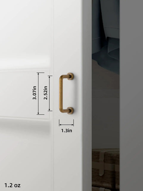 Five Inch Center To Center Warm Champagne Bronze Modern Cabinet Pulls In Brushed Zinc Alloy on white cabinet door