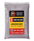 Bag of 400/600 grit silicon carbide pre-polish for rock tumblers with company logo and contact details.