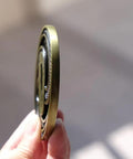 Side view of an alloy guard, part of Tsuba Fuchi Kashira Menuki Set For Samurai Swords Upgrade Your Blade Setup With Alloy Guard Fits Tsuka Handle Ferrule End Cap Size 8 To 9 Cm Guard And 7 To 8 Cm Width 3.14 To 3.54 In Handle DTZH88 Style For True Japanese Decor.