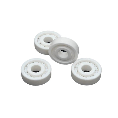 Heavy Duty 6203 Zirconia Ceramic Ball Bearings 17X40X12mm Angular Contact Oilless Design shown in close-up arrangement.
