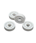 Hella Smooth Premium Full Ceramic Bearings 17 Mm X 40 Mm X 12 Mm Zirconia Ball Bearings 6203, four white ceramic ball bearings.