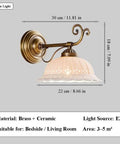 Ceramic Wall Sconce, 9 Inch Brass Vintage Light with floral cutout shade, antique brass finish, suitable for bedside or living room.