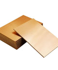 Image of Fifteen Pack FR4 Copper Clad Blank PCB Laminate 70 By 100 By 1.5mm Single Sided Circuit Board stacked and one piece angled.