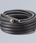 Pipe Insulation Foam Tubing One Inch Inner Diameter Six Feet Long Rubber Foam Insulation coiled on a white background