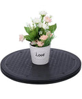Beefy 12 Inch Heavy Duty Rotating Swivel Ball Bearing Stand with potted flowers, anti-slip rubber bumper, supports up to 25 kg.