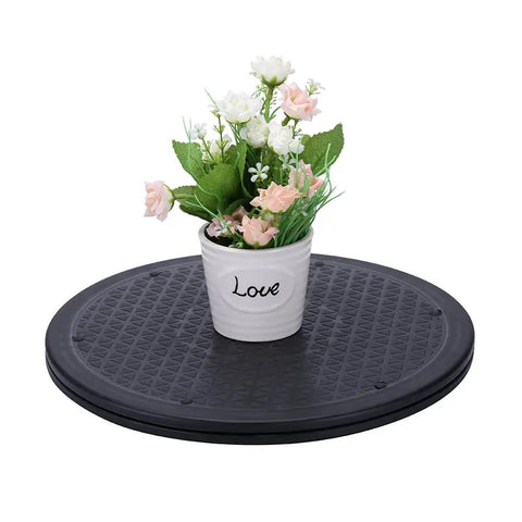 Beefy 12 Inch Heavy Duty Rotating Swivel Ball Bearing Stand with potted flowers, anti-slip rubber bumper, supports up to 25 kg.