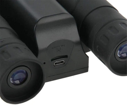 Close-up of the USB port on a 12x32 HD Binocular Telescope With A Dope 5MP Digital Camera, suitable for bird watching and stargazing.