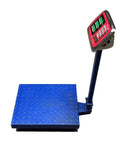 Heavy Duty Foldable Digital Floor Scale Delivering Straight Shooter Accuracy HD LCD Display And No Hassle Rechargeable Power For Luggage And Parcel Weighing Up To Six Sixty Pounds, blue metal platform with LCD display.