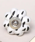 Fifty Piece White Ceramic Etched Drawer Knobs For Kitchen Cabinet Hardware Serving Dope Vintage Flair And Rust Free Slick Hardware Solid Decorative Door Pulls For Dresser. White ceramic knob with black accents and silver base.