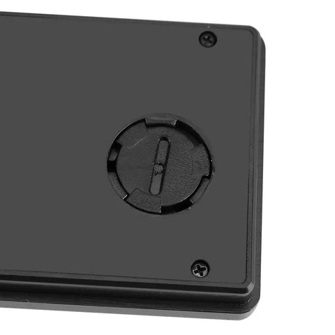 Ultra Thin Digital Clock With Wide Lcd Panel And Adhesive Mount For Car Dashboard Home Desk Ride Ready compact base view.
