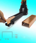 Heavy Duty Pneumatic Carton Sealer With High Speed Fast Nailing Action Robust Metal Construction Tool Free Depth Adjustment For Reliable Box Closing And Efficient Packaging Operations In Warehouse Environments, showing staples and a hand loading fasteners.