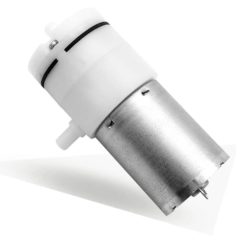 DC 6V Mini Air Pump With Beefy Aluminum Housing, Direct Suction Vacuum Booster For Aquariums And Lab Gear, Smooth Three Liter Output, Dead Simple Hookup, close-up view showing aluminum housing and plastic fittings.