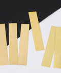 Brass Shim Stock Set, 18 Pcs Rectangular Shims 5.9 x 0.98 Inch With 6 Thicknesses, shown loose on black and white background.