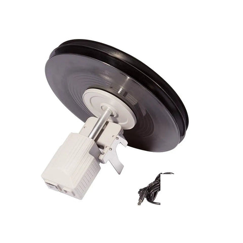 Top Shelf Ultrasonic Vinyl Cleaner Featuring Digital Controls And Stainless Steel Basin to blast away dirt buildup, showing vinyl record with cleaner.