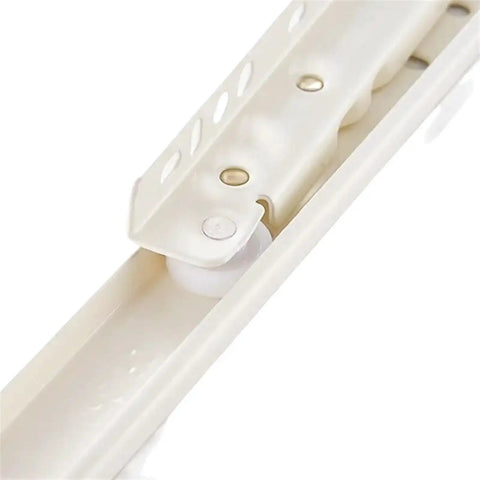 Close-up of 16 inch full extension drawer slides for cabinets and desks with dual slide rails and quiet rollers in white.