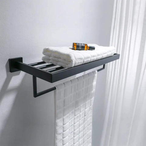 Square Towel Rack With Single Bar Wall Mount Shelf Rustproof Stainless Steel In Matte Black Finish holding white towels.
