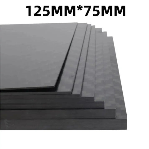 Carbon Fiber Plate Panel Sheets 125mm by 75mm Pro Grade 0.5mm to 5mm Thick showing stacked composite material sheets.