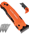 Klein Tools 2-in-1 FLICKBLADE folding utility knife with scraper and blade storage, orange handle; front view