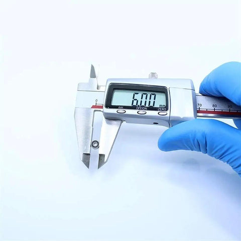 Digital caliper measuring MR62RS 2RS sealed ball bearing diameter for RC hobbyists cars and trucks precision use