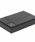Compact 10400mAh UPS Battery Backup With 36W Output, black casing, showcasing power indicators and efficient design.