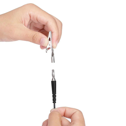 Hands connecting alligator clip and cable for Anti Static Wrist Strap Eleven Inch Grounding Bracelet With Alligator Clip And Extendable Cable No Fuss Adjustable Fits Wrists Six To Eight Point Five Inches Red ESD Safe For PC Repair And Electronics Assembly.