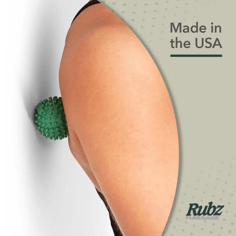 Person using Foot Rubz Hand And Back Massage Ball For Plantar Fasciitis Pain Relief Sore Feet And Tight Muscles on upper back.